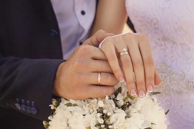 couple showing wedding ring